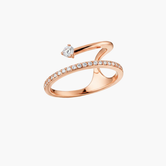 Rose gold ring with diamonds on a white background