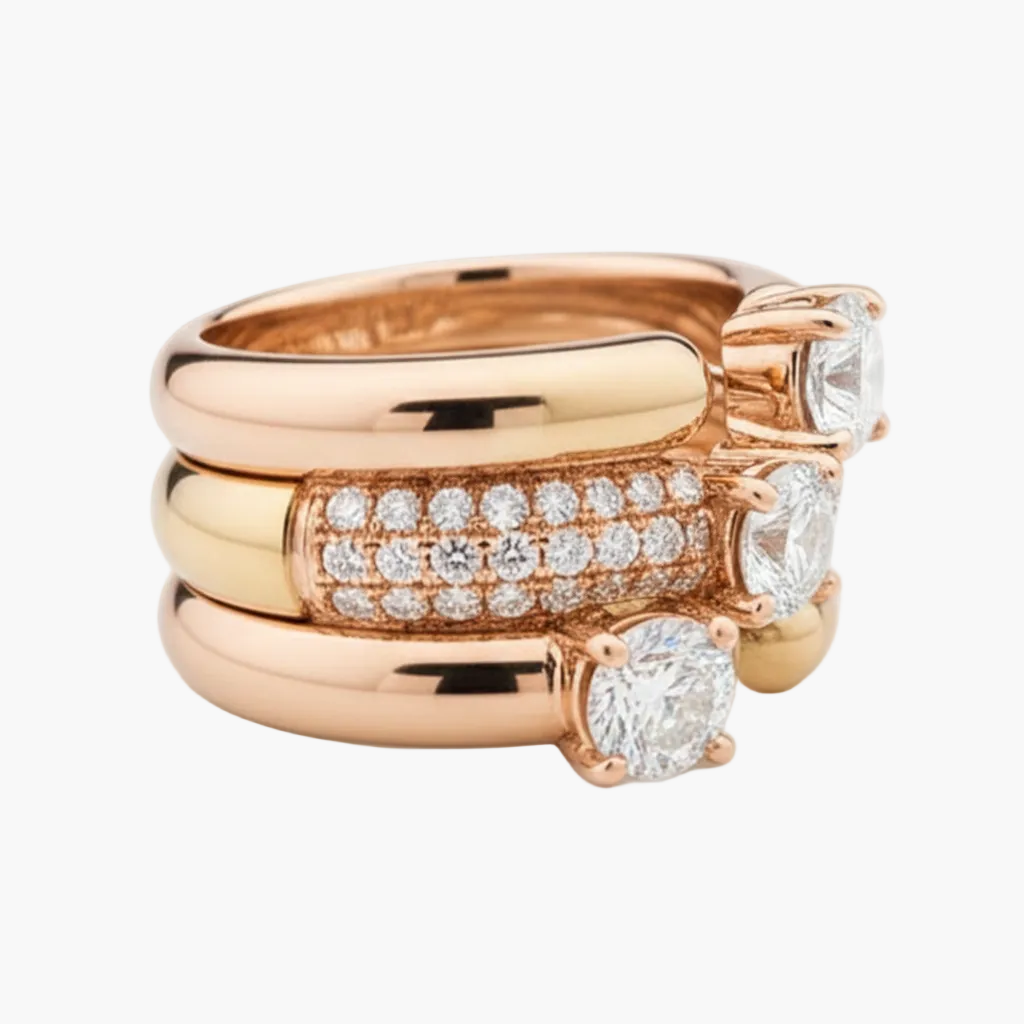 Rose gold ring with diamond accents on a white background