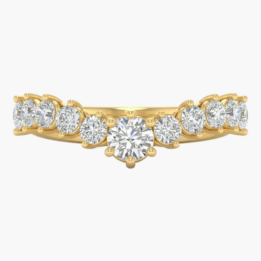 Gold ring with round diamonds on a white background