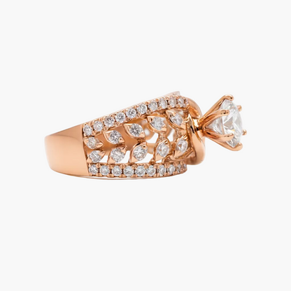Rose gold ring with diamond accents on a white background