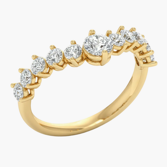 Gold ring with diamonds on a white background
