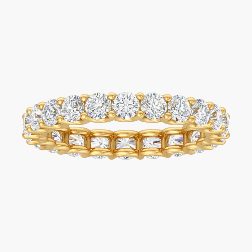 Gold and diamond ring on a white background