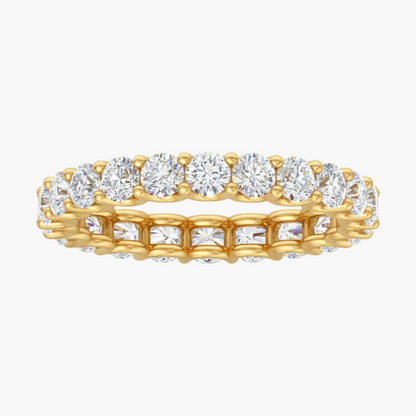 Gold and diamond ring on a white background