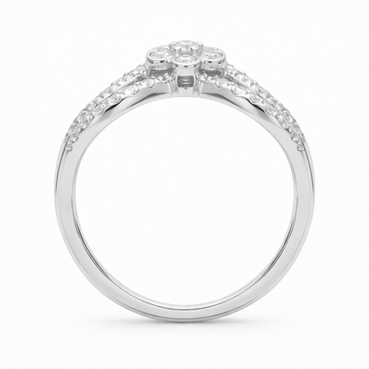 Silver ring with diamond accents on a white background