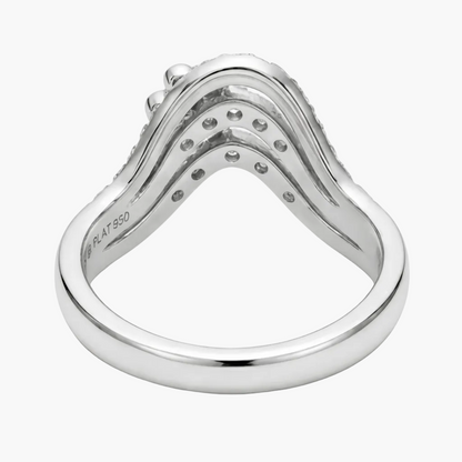 Silver ring with diamond accents on a white background