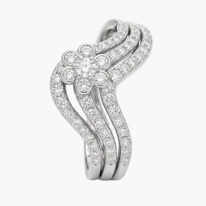 Silver ring with diamond accents on a white background