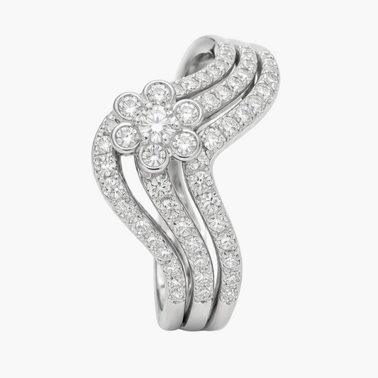 Silver ring with diamond accents on a white background