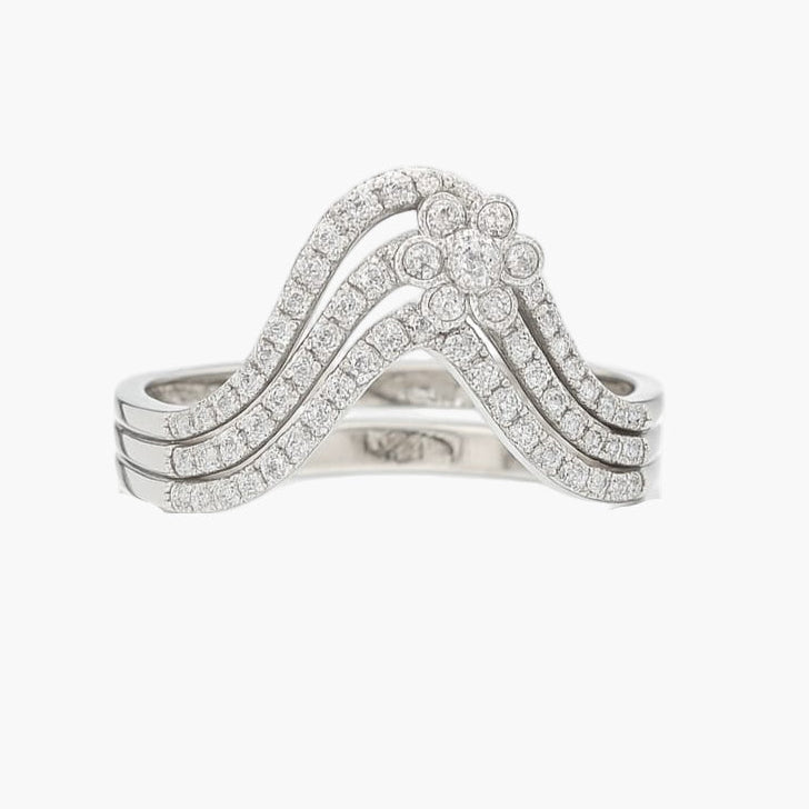 Silver ring with diamond accents on a white background