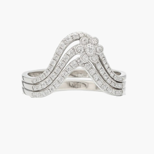 Silver ring with diamond accents on a white background