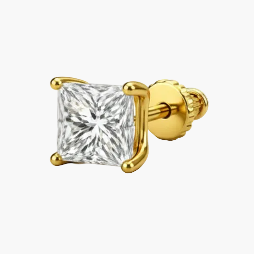 Gold earring with a clear gemstone on a white background