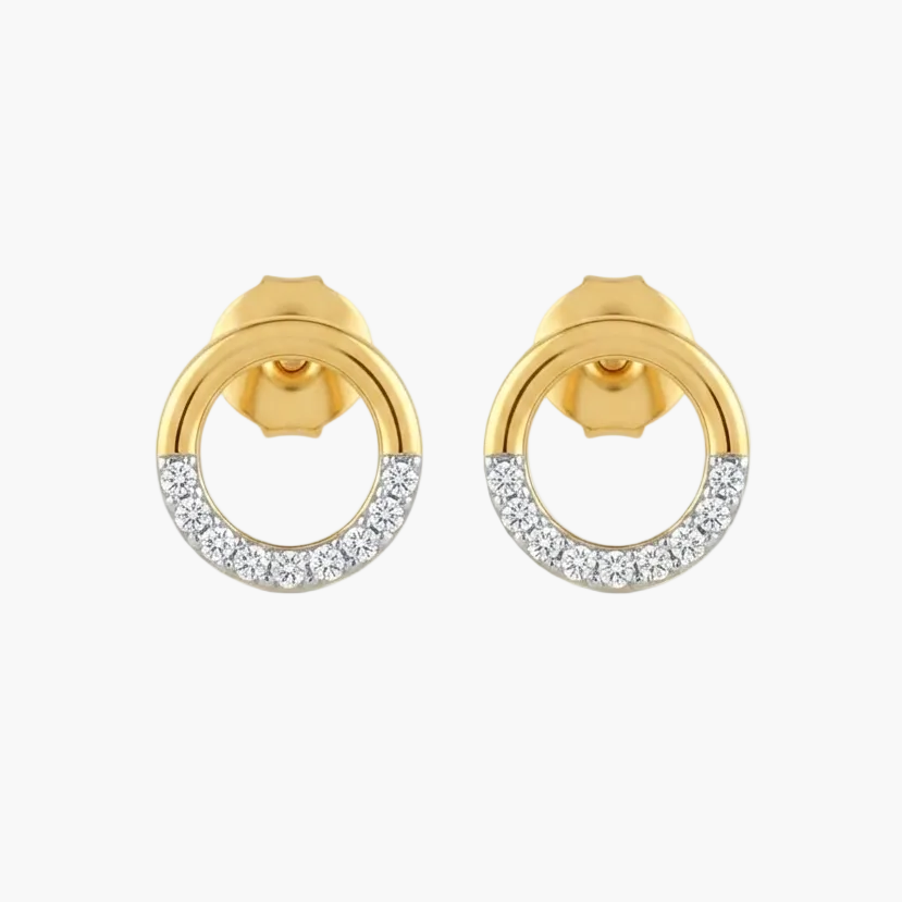 A pair of gold hoop earrings with a row of clear pavé stones along the lower half of each hoop, set against a plain white background.