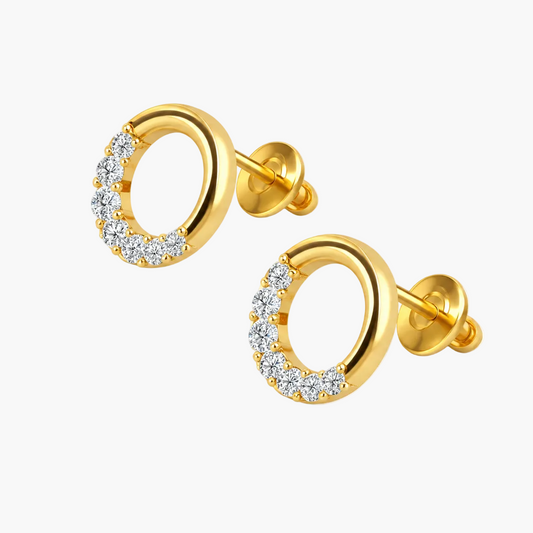 A pair of gold crescent-shaped stud earrings with a row of clear pavé-set stones along the curve, shown on a clean white background.