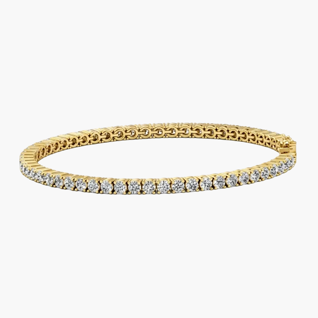 Gold bracelet with diamonds on a white background
