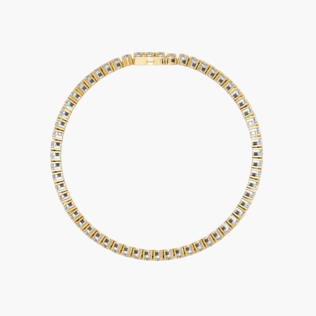 Gold and silver bracelet on a white background