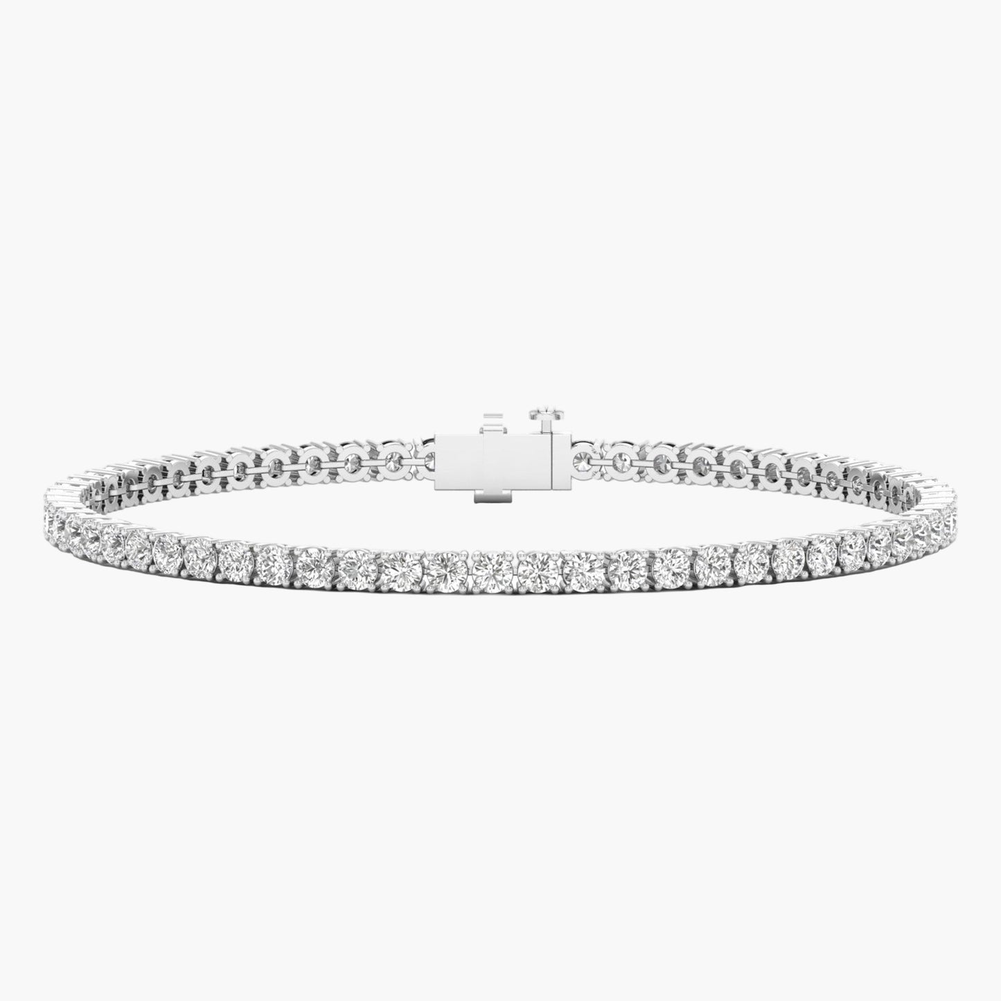 Silver bracelet with clear stones on a white background