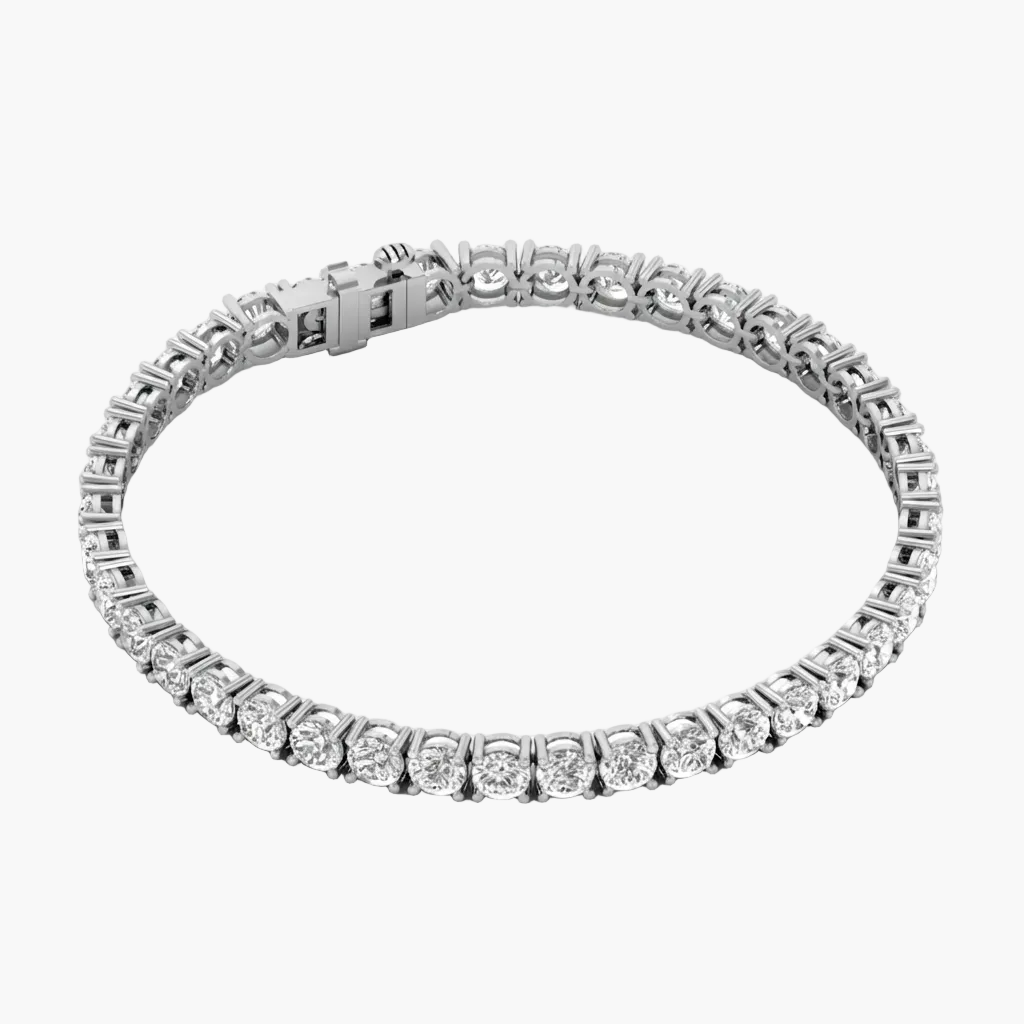 A silver tennis bracelet with round-cut clear stones, shown on a clean white background.