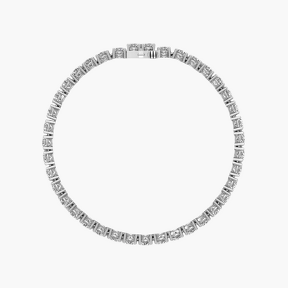 Silver bracelet with clear stones on a white background