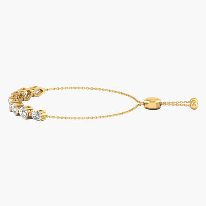 Gold bracelet with diamond accents on a white background