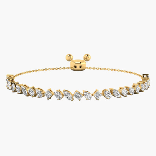Gold bracelet with diamond accents on a white background