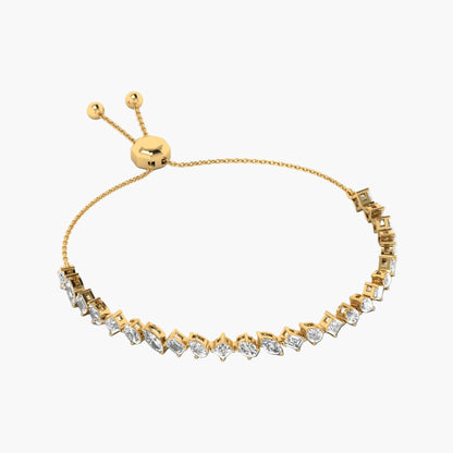 Gold bracelet with diamond accents on a white background
