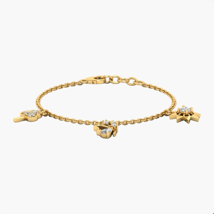 Gold bracelet with charms on a white background