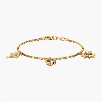Gold bracelet with charms on a white background