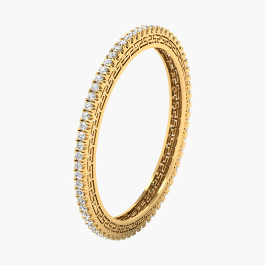 Gold ring with diamond accents on a white background