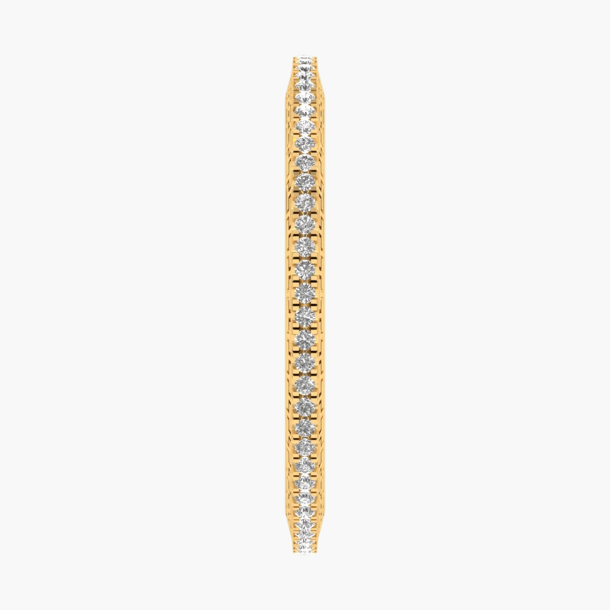 Gold earring with embedded diamonds on a white background