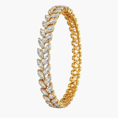 Gold bracelet with diamond accents on a white background