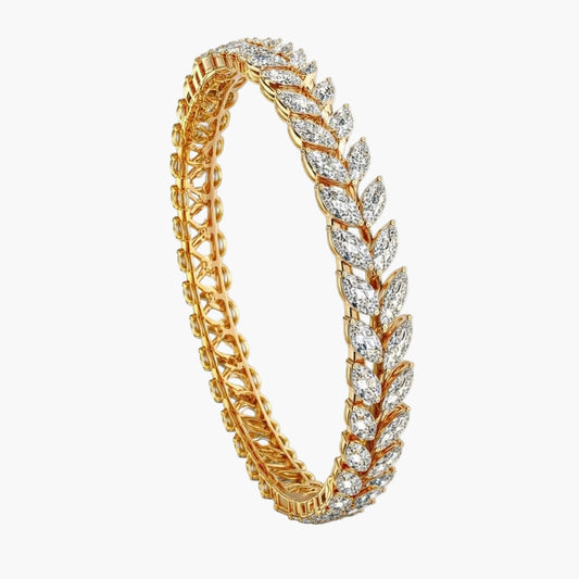Gold bracelet with diamond accents on a white background