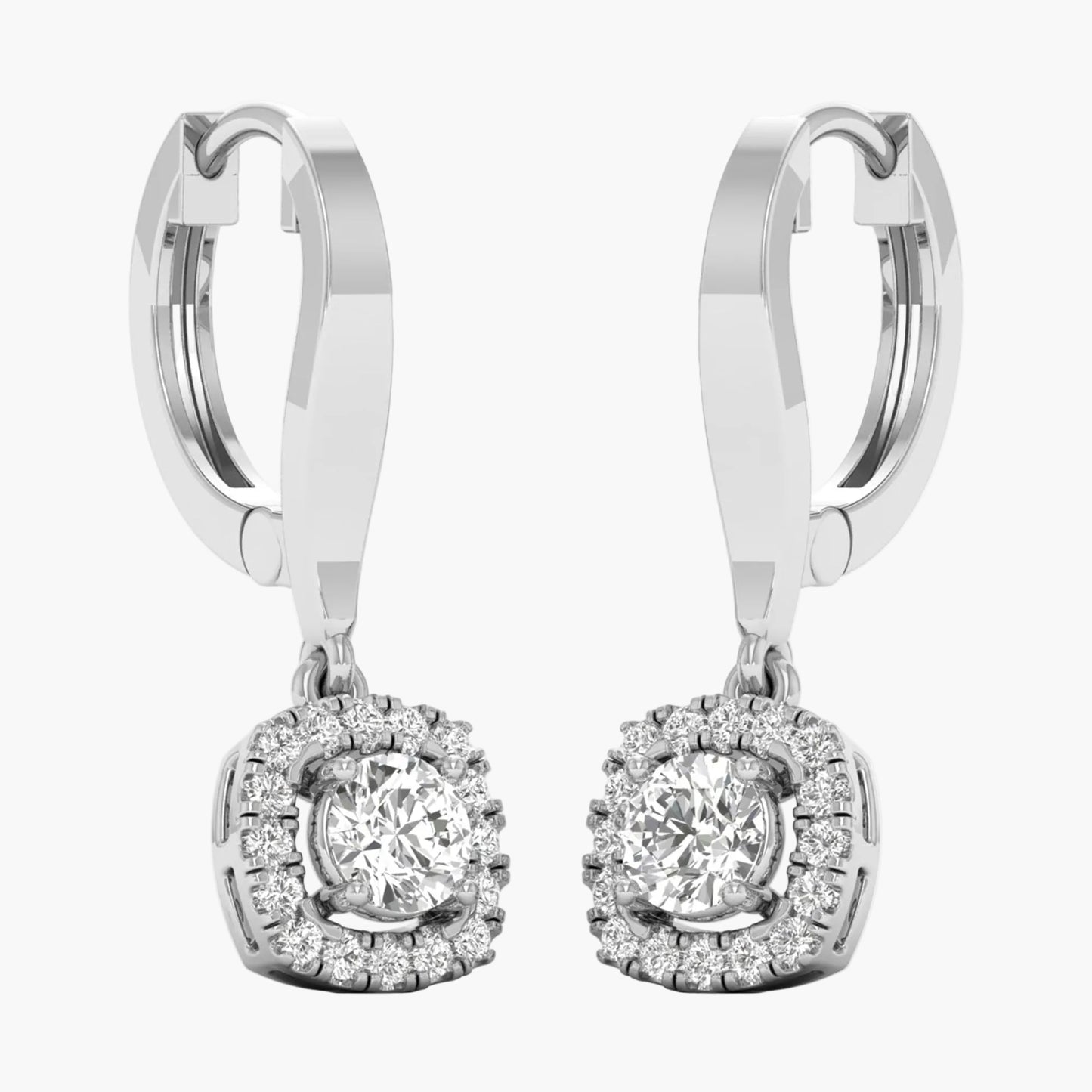 Pair of silver hoop earrings with round gemstones on a white background