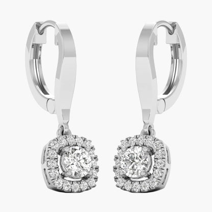 Pair of silver hoop earrings with round gemstones on a white background