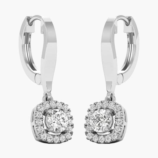 Pair of silver hoop earrings with round gemstones on a white background