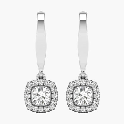 Pair of silver hoop earrings with clear gemstones on a white background