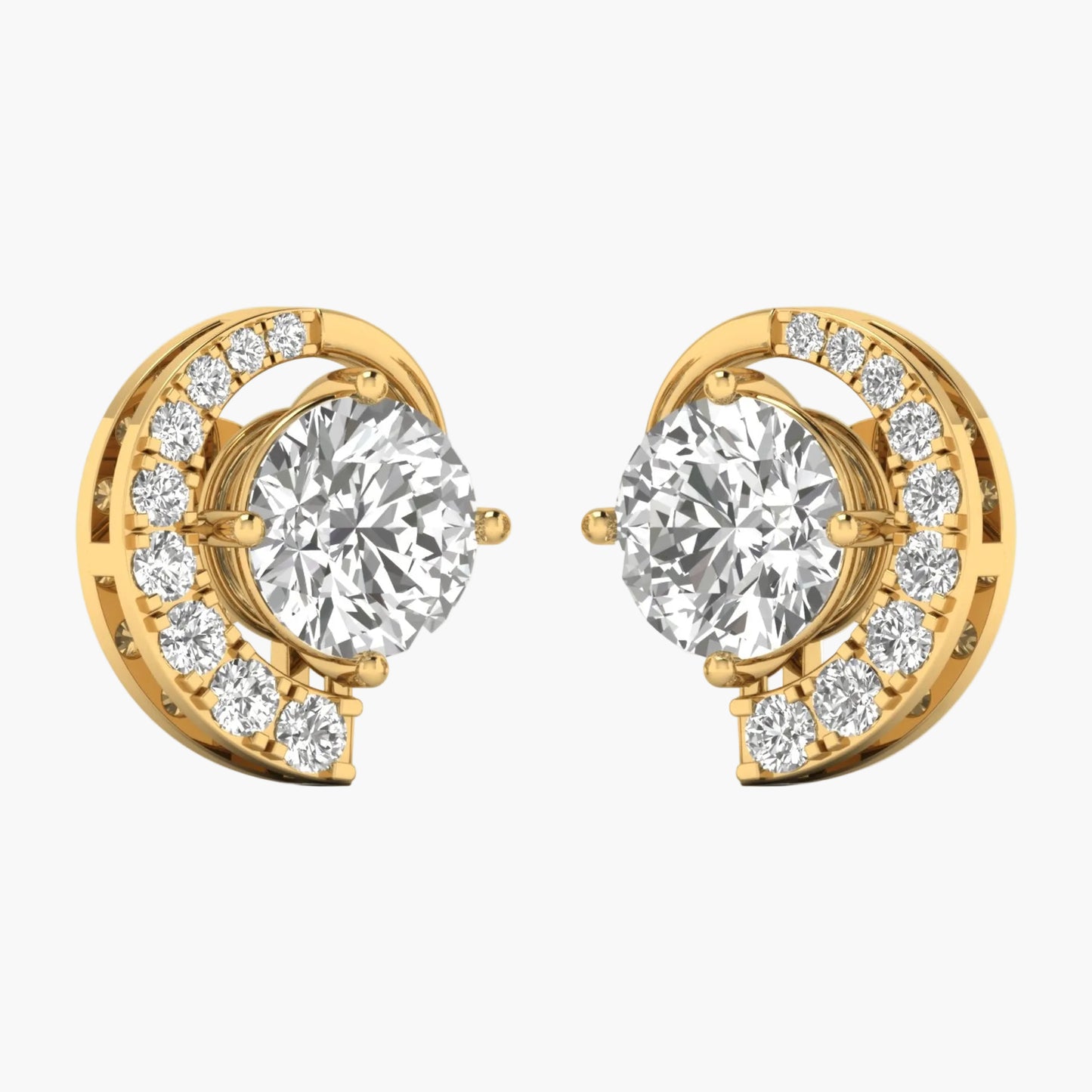 Gold earrings with clear gemstones on a white background