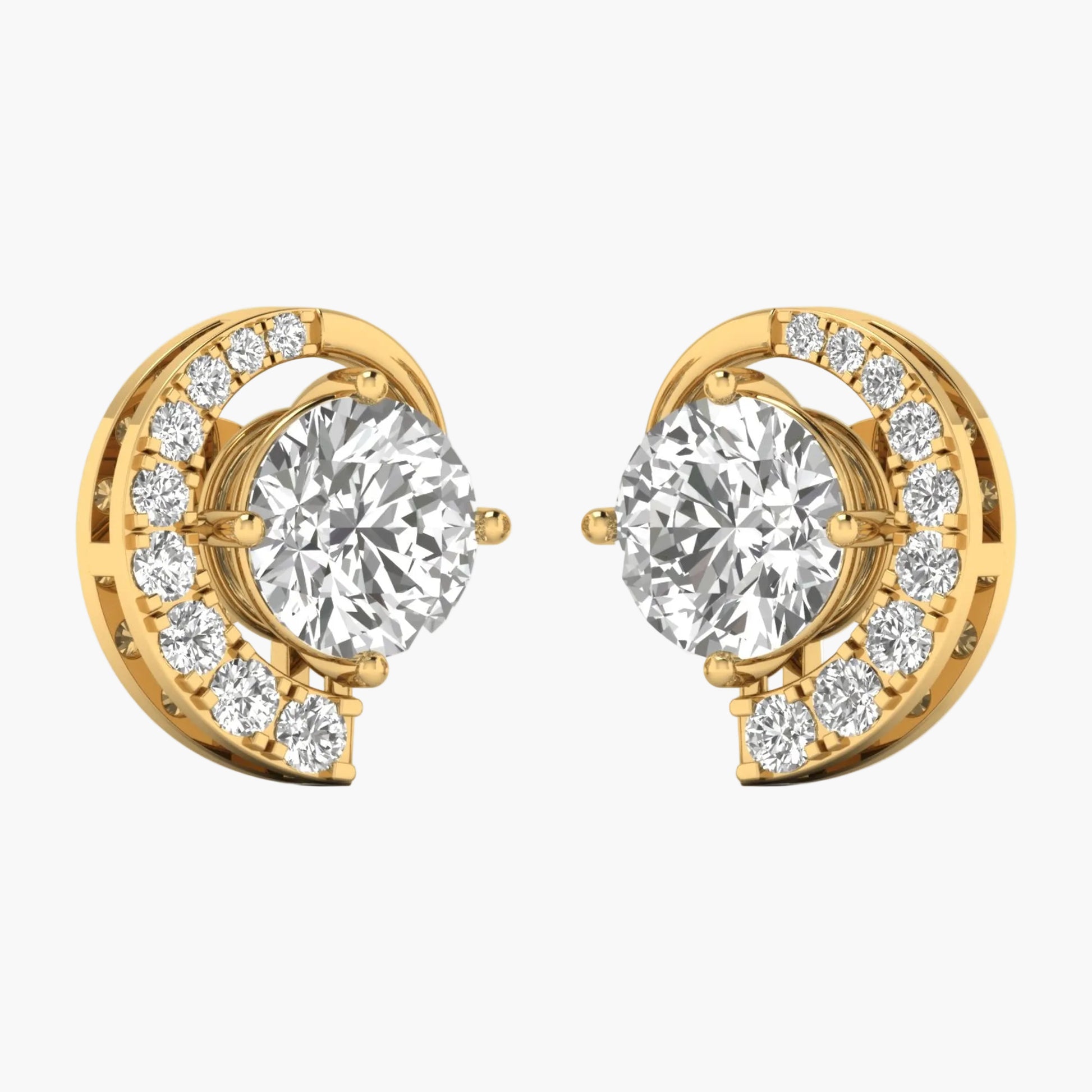 Gold earrings with clear gemstones on a white background