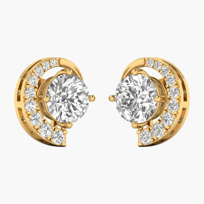 Gold earrings with clear gemstones on a white background