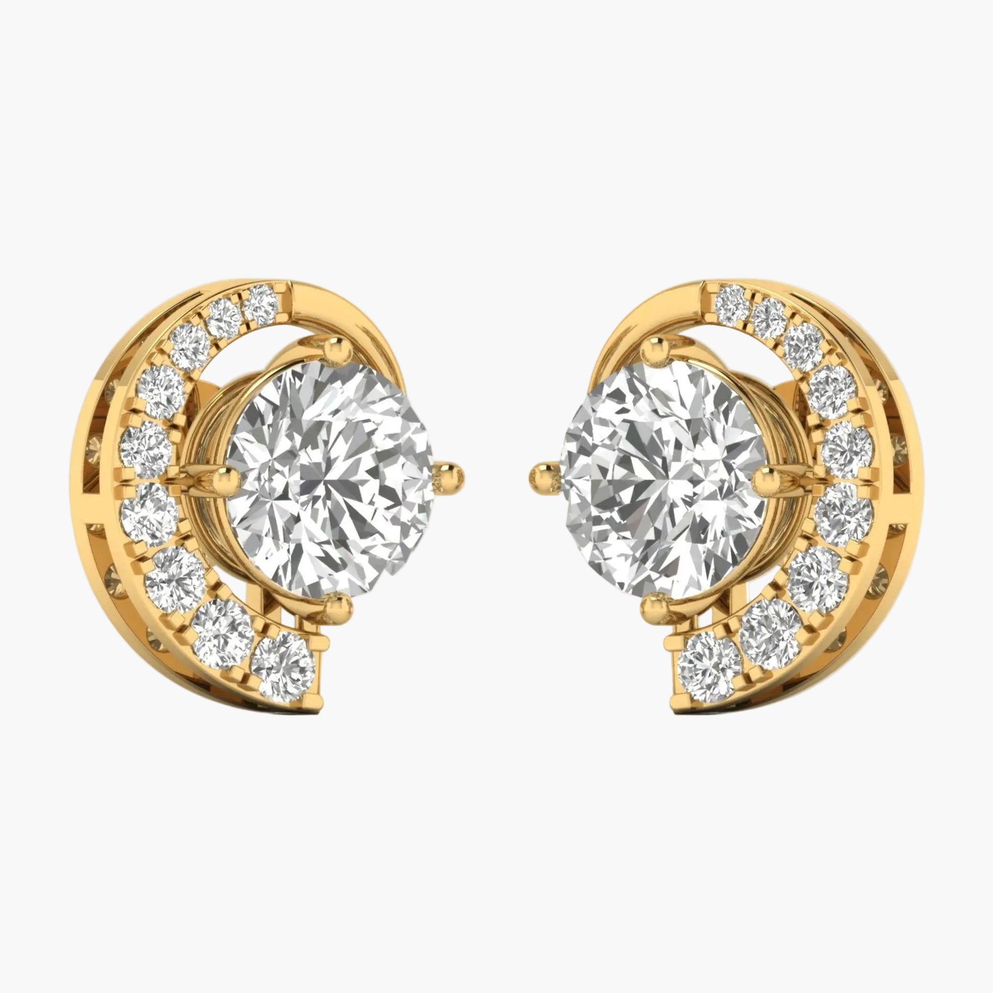 Gold earrings with clear gemstones on a white background