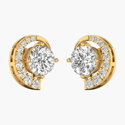 Gold earrings with clear gemstones on a white background