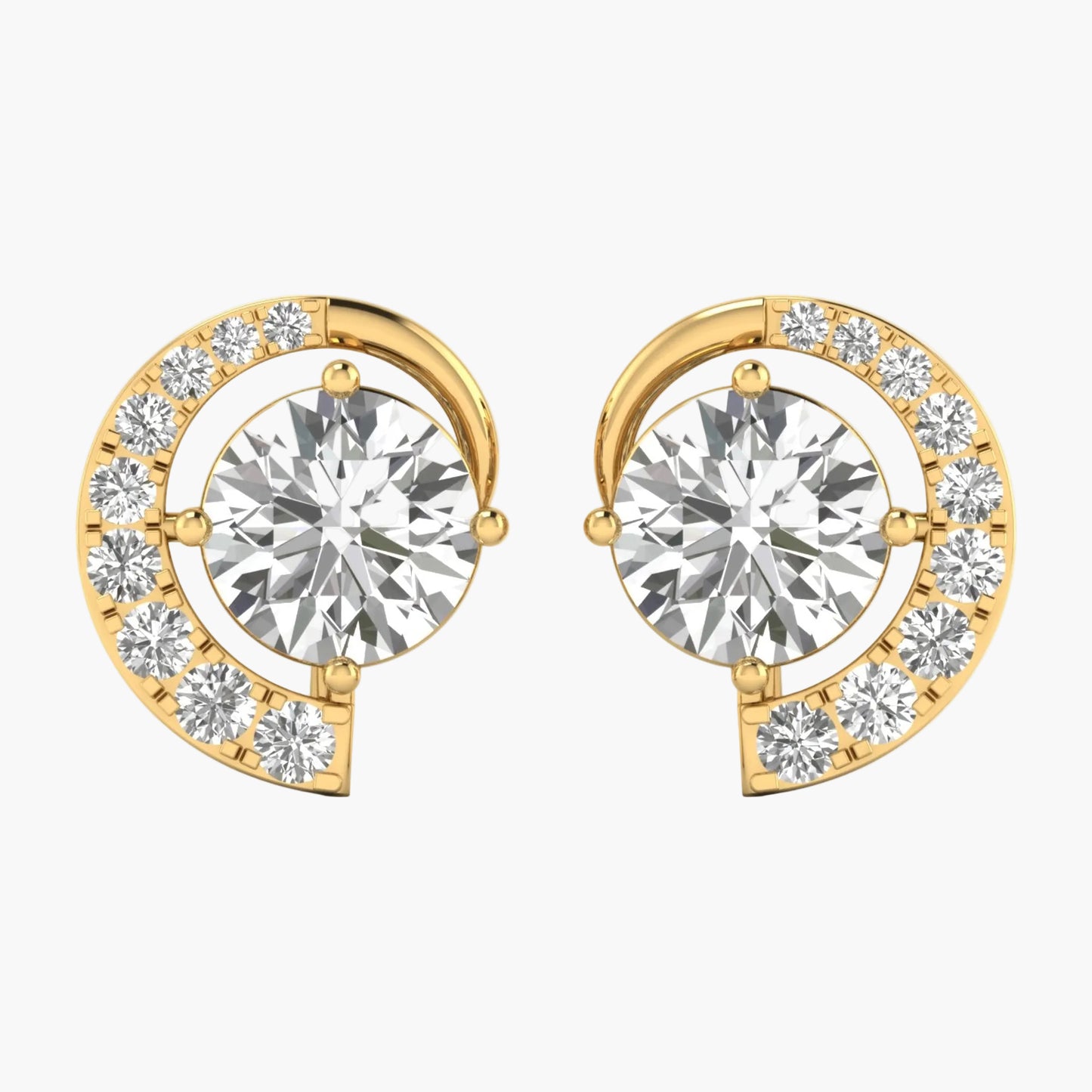 Gold earrings with round gemstones on a white background