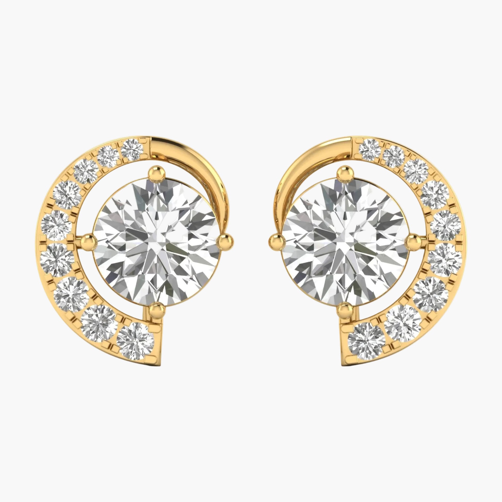Gold earrings with round gemstones on a white background