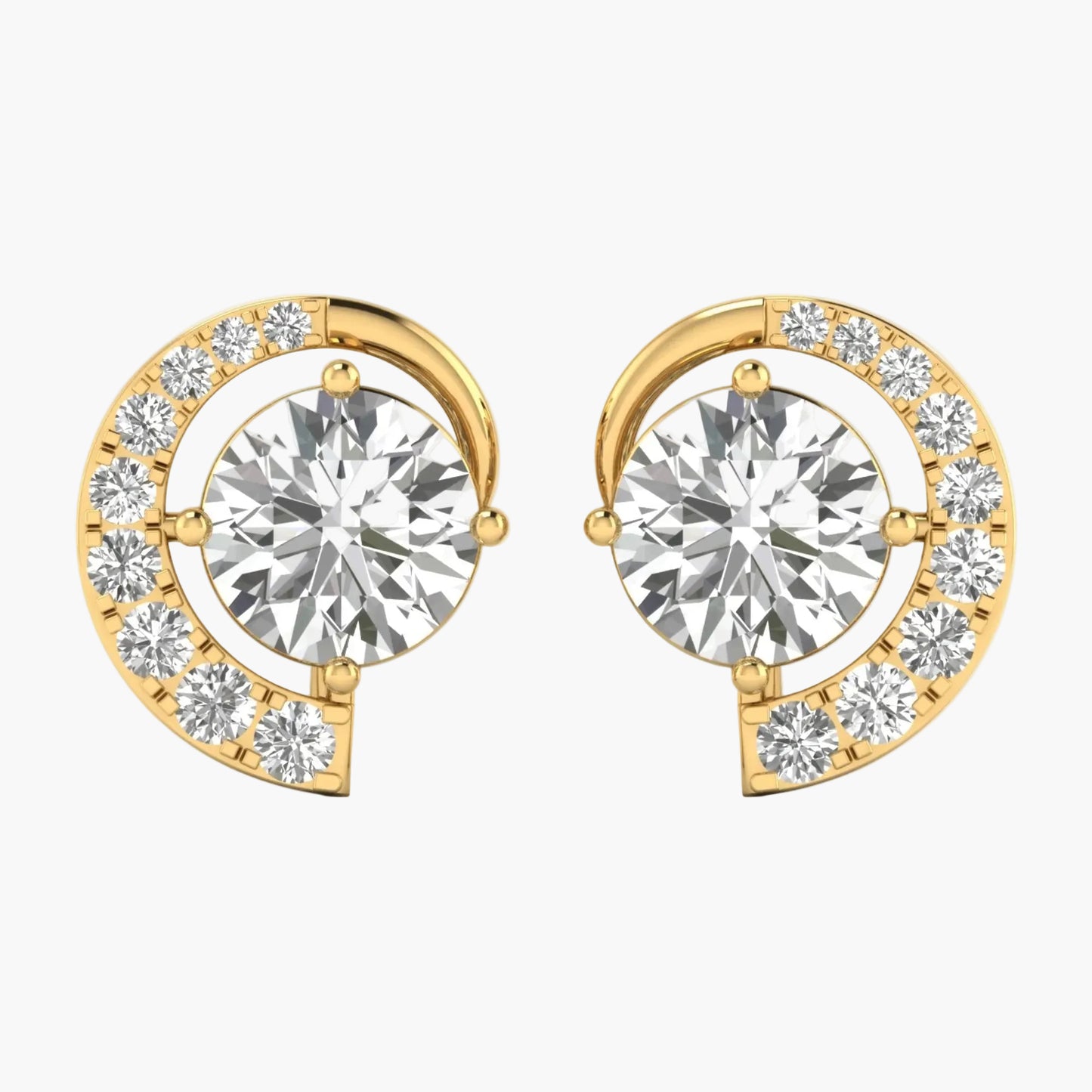 Gold earrings with round gemstones on a white background