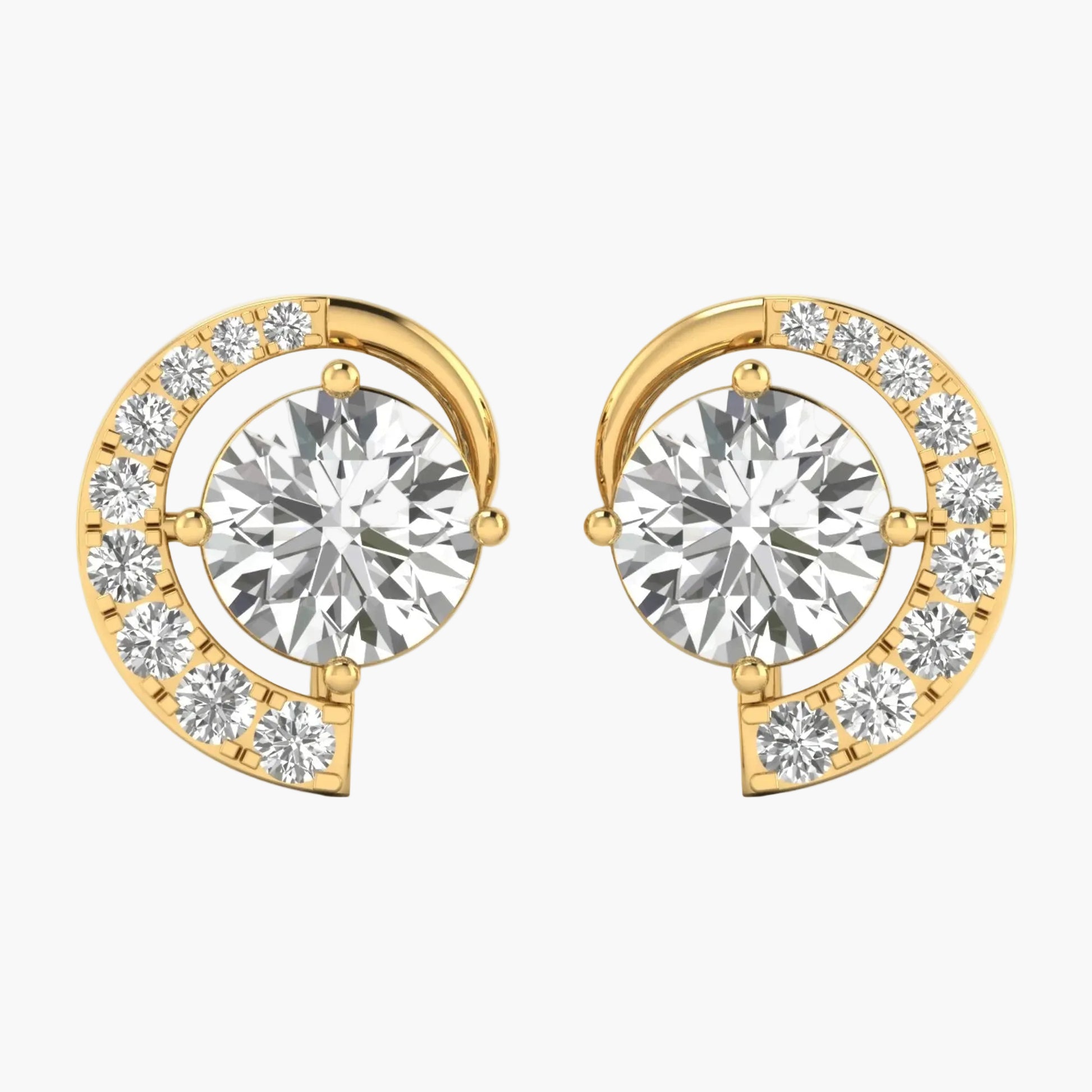 Gold earrings with round gemstones on a white background