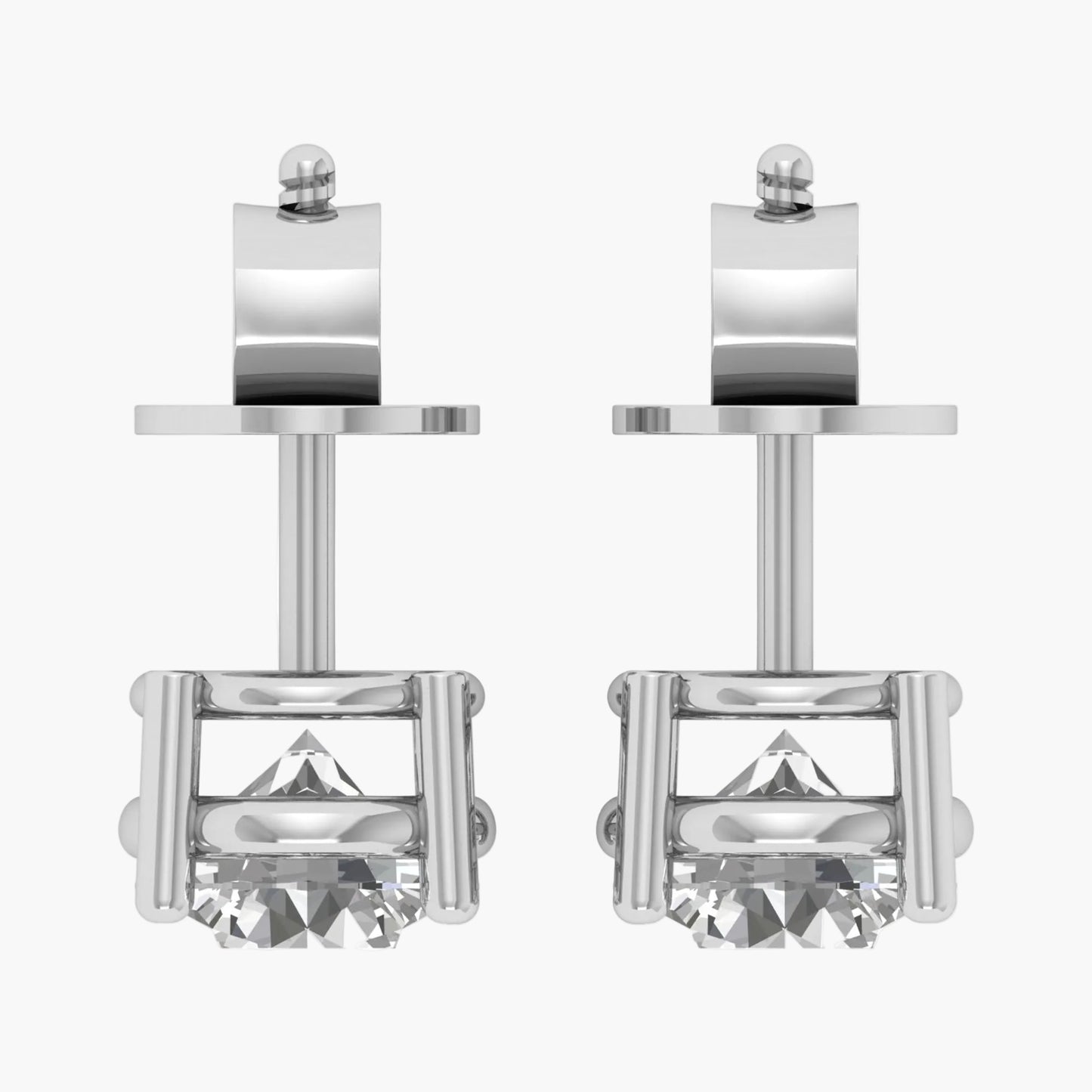 Pair of silver stud earrings with a clear gemstone on a white background