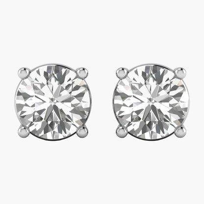 Pair of diamond stud earrings on a white background