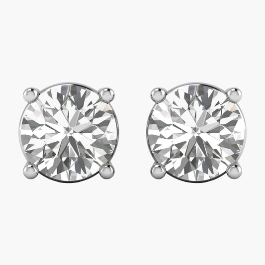 Pair of diamond stud earrings on a white background