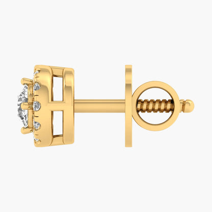 Gold earring with diamond-like stones on a white background