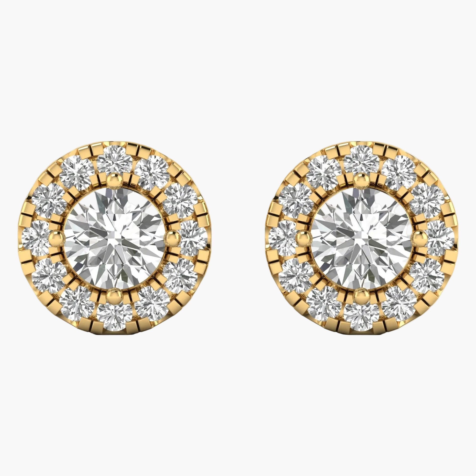 Pair of gold and diamond earrings on a white background