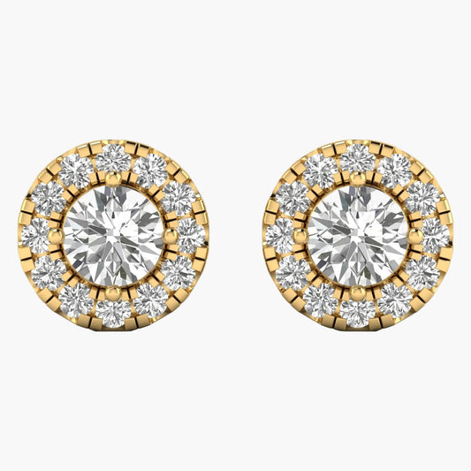 Pair of gold and diamond earrings on a white background