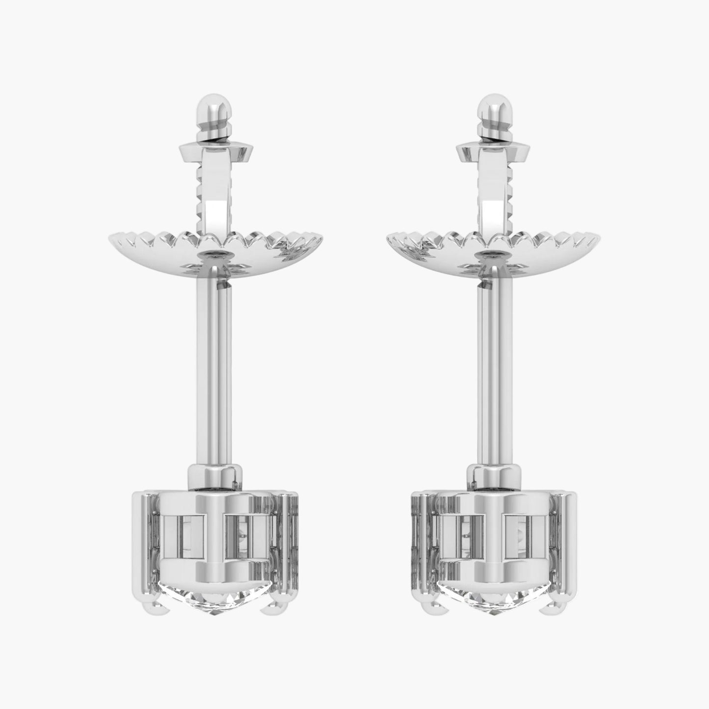 Pair of silver earrings with intricate designs on a white background